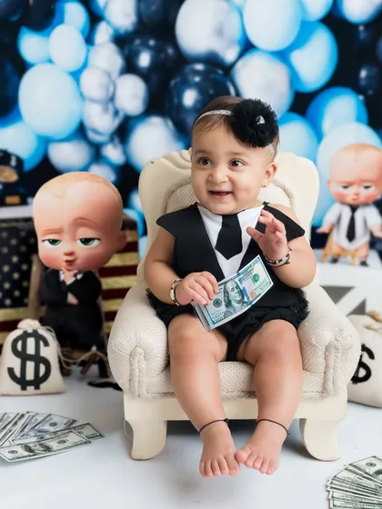 This little boss is ready for business! The "Boss Baby" theme is always a hit for capturing those big personalities in tiny packages.