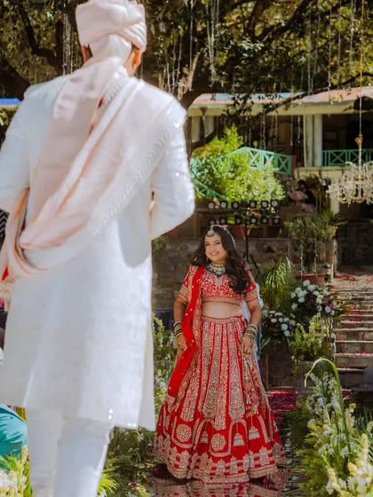 The first look moment. The bride's simple, elegant open hairstyle allows her natural beauty and happiness to be the focus of this destination wedding.