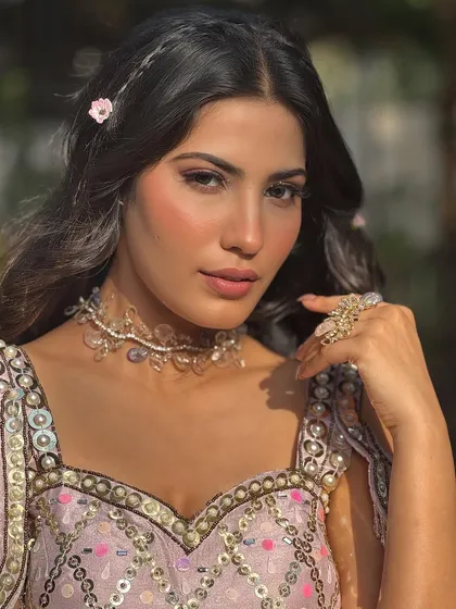 A soft and dreamy look perfect for a Mehendi carnival. I created a fresh, rose-toned makeup look and styled her hair with romantic waves and dainty floral accessories for a whimsical charm.