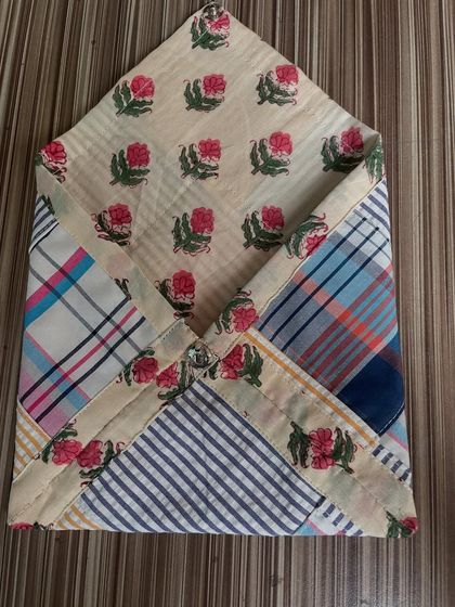 The final folded envelope pouch, a beautiful and functional item made from repurposed materials.