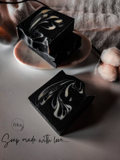 What makes my soap bars so special? It's the heart I pour into each one. This charcoal swirl soap showcases my commitment to clean, plant-based ingredients and traditional cold-process methods.