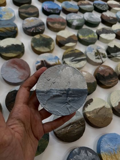 A moody seascape captured on a small circular board. These pieces can be purchased as a set to create your own custom wall decor.