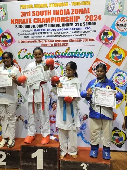 We build champions. Here is my student, Shikha, proudly taking the top spot on the podium with her Gold medal at the South India Zonal Karate Championship.