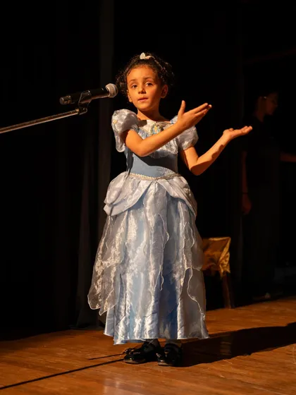 A young princess character delivering her lines with grace and poise. We work on building a confident and elegant stage presence.