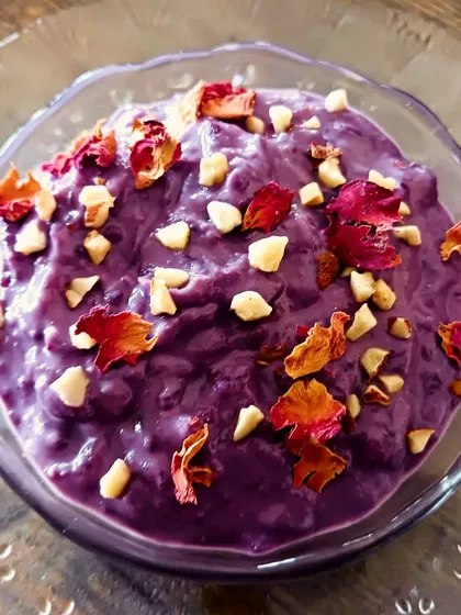A rich and royal dessert made from purple rice and black carrots. This beautiful kheer is naturally sweetened and garnished with nuts and rose petals, showing how you can enjoy decadent sweets the healthy way.
