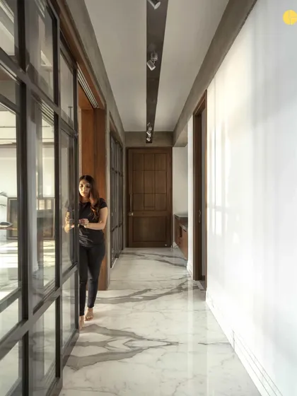 A view down the main corridor of 'The Canvas' before renovations. This empty hallway held the potential for the dramatic, art-filled passage it would become.
