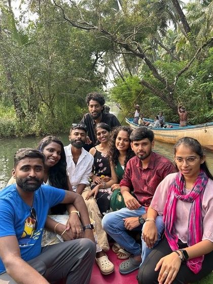 A group of friends enjoying the boat ride in Honnavara.