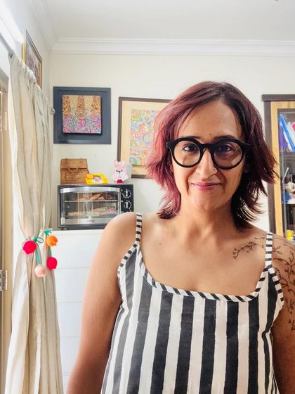 A close-up selfie showing my glasses, which have become a part of my signature look.