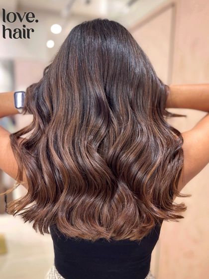 The full back view of our 'chocolate lava' balayage, a deep and rich colour that's perfect for those who want a subtle but luxurious update.