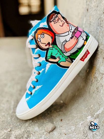 A full view of the Family Guy side of the custom Levi's high-tops, featuring Peter and Lois Griffin.