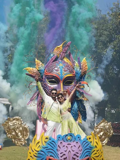 Your pre-wedding carnival should be an explosion of fun and personality. I create larger-than-life themed entries, like this massive carnival mask float, complete with color smoke and performers to kickstart the celebration with a bang.
