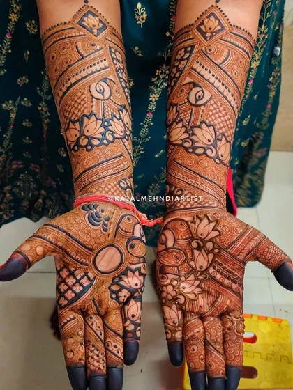 A gorgeous non-figurative bridal design that focuses on the beauty of patterns. This piece features a mix of lotus motifs, paisleys, and geometric fills.