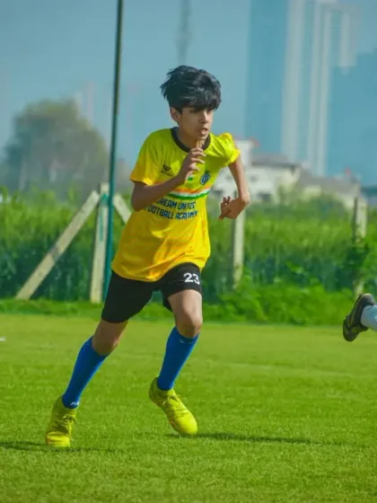 Players race for a loose ball, showcasing the speed and agility of our young athletes.