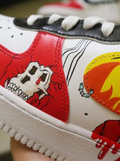 For the NFT and crypto art fans. I painted a flaming zombie from the Mutant Ape Yacht Club (MAYC) collection onto these Nike AF1s, complete with a bold, comic-book aesthetic and dripping red paint effects.