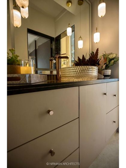 A different angle of the wash area in the Duplex Project, showcasing the beautiful pendant lights that create a luxurious, hotel-like feel in the corridor.
