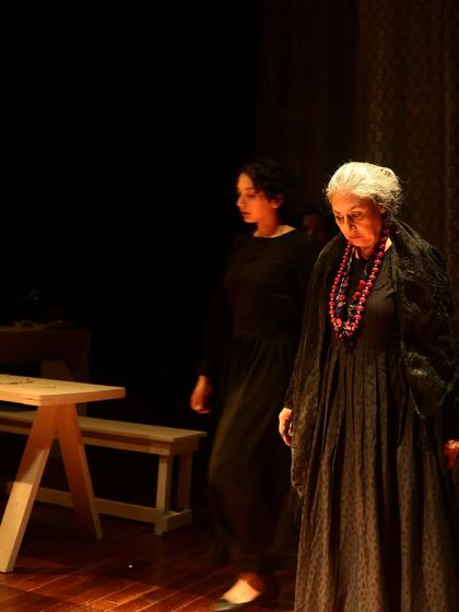 A scene from Lorca's masterpiece, "The House of Bernarda Alba." Our staging captures the quiet tensions and unspoken desires simmering among the five daughters confined by their mother's decree.