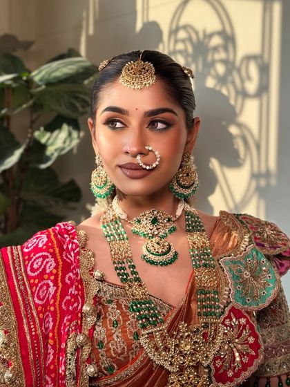 Bathed in natural light, this shot shows the true-to-skin finish of the makeup. The bride looks radiant and authentically beautiful.