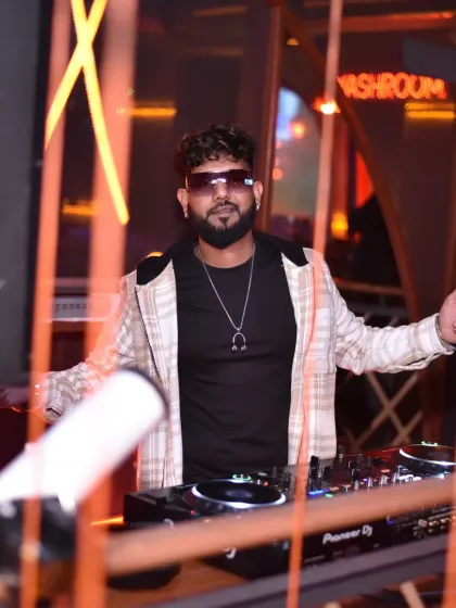 Welcoming the crowd with open arms. My booth is the heart of the party.