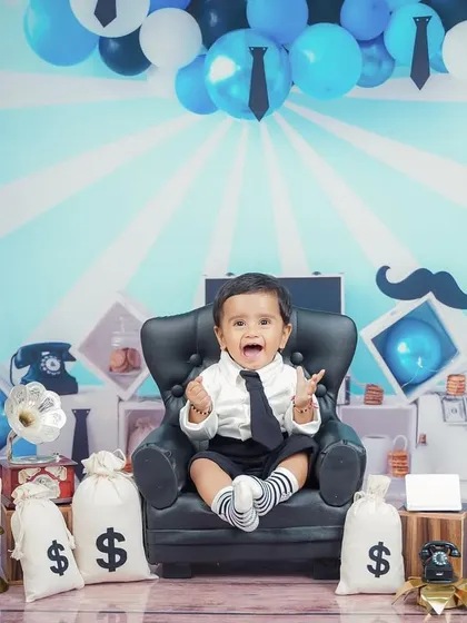 Who's the boss? This little guy is, in our popular 'Boss Baby' themed shoot. It's a fun, playful concept that brings out the cheeky and confident personality of your toddler.