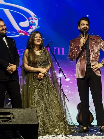 Another angle of my interaction with the couple, showcasing the grand stage setup and happy faces.