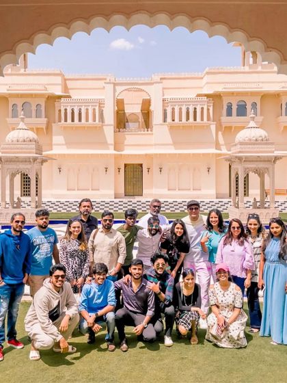 Meet the dream team. Every member of our crew brings unique talent and creativity to ensure every detail is perfect. This photo captures the heart and soul of our efforts at a destination wedding in Udaipur.