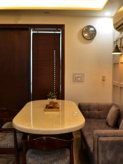 Another angle of the compact and cozy dining space, demonstrating how we maximize comfort and style even in smaller areas.