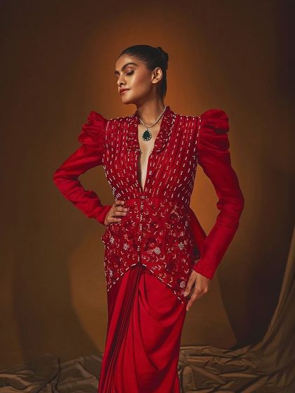 A close-up of the Amira set from Label Japji Arora, focusing on the puff-sleeved jacket and intricate embroidery.