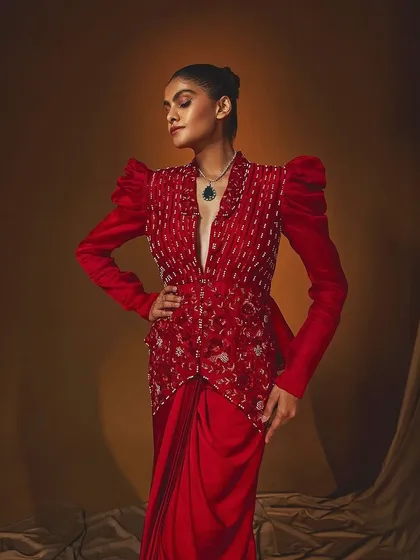 A close-up of the Amira set from Label Japji Arora, focusing on the puff-sleeved jacket and intricate embroidery.