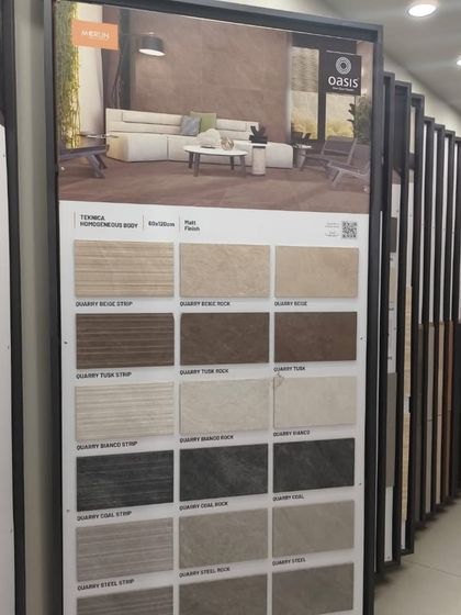 A display showing various textured tiles from our collection. These are perfect for adding subtle depth and interest to walls and floors.