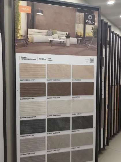 A display showing various textured tiles from our collection. These are perfect for adding subtle depth and interest to walls and floors.