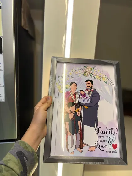 A different angle of the heartwarming family illustration, showing how the grey frame complements the artwork. This is a perfect gift to celebrate family bonds and new beginnings.