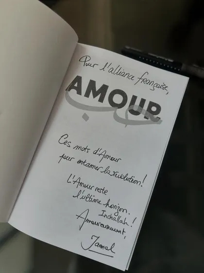 "Ces mots d'Amour pour entamer la révolution!" A beautiful inscription from author Jamal Ouazzani in his book 'Amour', which you can now find in our library.