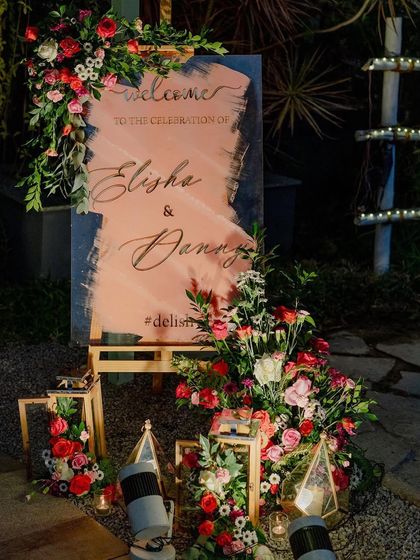 The perfect setting for a pre-wedding cocktail party or sangeet night. The lawn provides ample space for a dance floor, while the surrounding trees, lit with elegant chandeliers and string lights, create a festive and celebratory atmosphere.