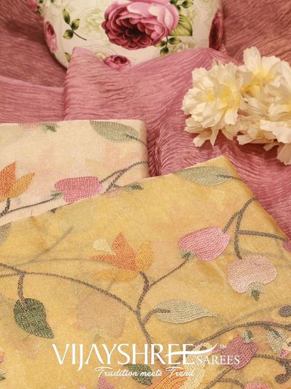 A styled shot of the tissue silk sarees, highlighting their delicate and artistic nature.