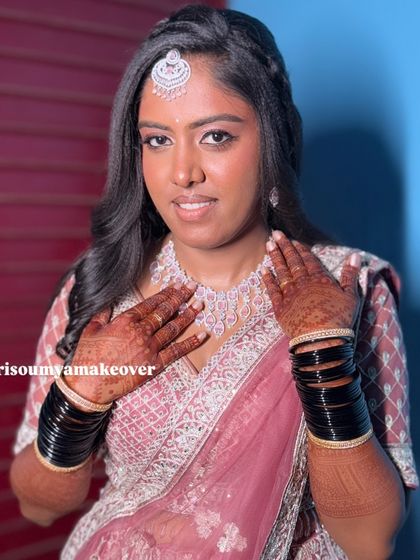 The final look for my beautiful bride Vaani. Her smile says it all. The makeup, hair, and outfit came together to create pure reception magic.