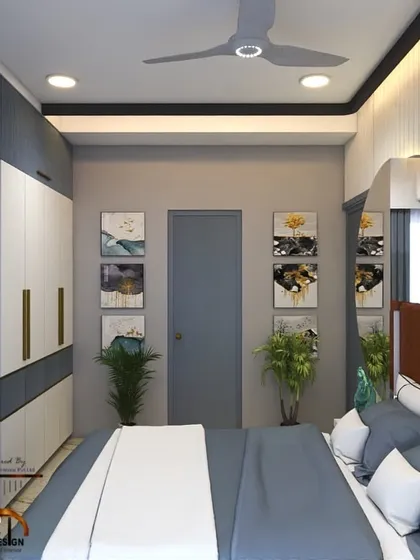 A well-designed bedroom featuring a dual-tone wardrobe and an integrated study desk. The color palette and clean lines make it a perfect space for a teenager or a guest room.