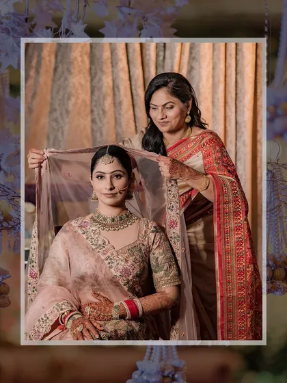 A touching moment between the bride and her mother, who is adjusting her veil. A beautiful capture of mother-daughter love.