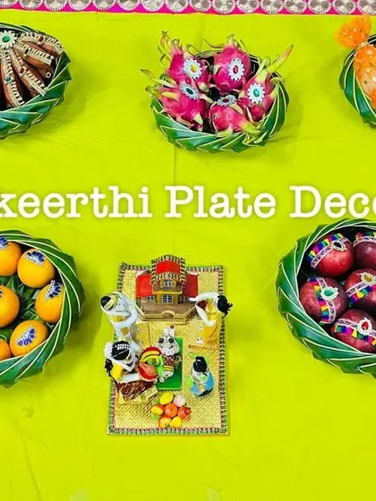 A simple and elegant plate arrangement for a housewarming ceremony in Sirumugai, featuring decorated fruits and a small thematic doll set.