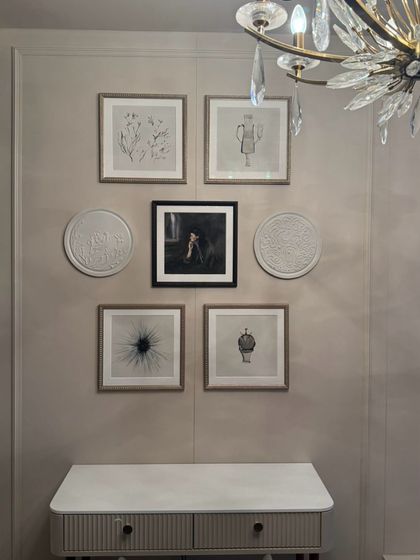 This is a set of seven artworks I created for a residence in Mumbai. It features a mix of framed line drawings and circular textured pieces to create a sophisticated and modern gallery wall.
