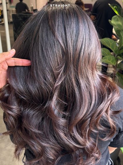 A swirl of mocha and magic. I created this rich brunette blend with soft, bouncy curls for a look that's both elegant and fun.