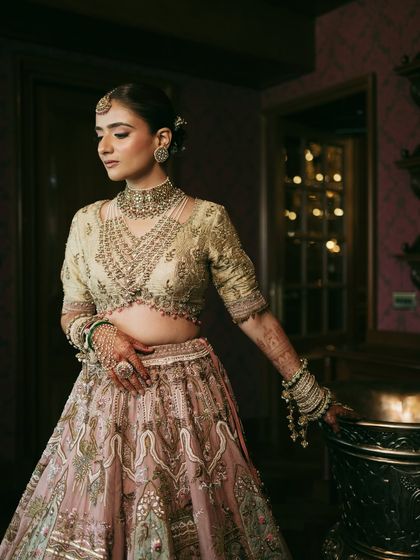 A candid moment showing Vasav's complete look. The soft tones and elegant styling created a look of pure, understated luxury.