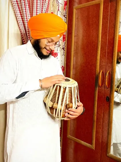 A moment of connection with my instrument. The tabla is more than just wood and skin to me; it is a friend and a medium for my soul's expression.