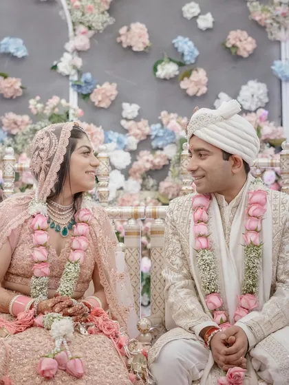 Sugam and Anchit share a look after their pheras. These quiet moments of connection amidst the grandeur of the ceremony are what we cherish, showing the deep bond between the couple.