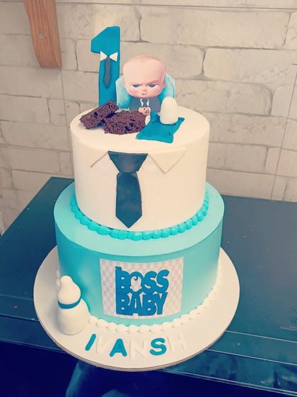 Another fun Boss Baby cake for a first birthday. This design features the iconic suit and tie, with the baby character sitting on top.