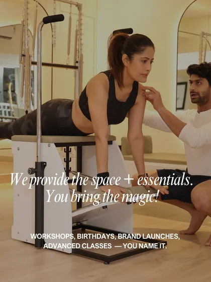 We provide the space, the state-of-the-art equipment, and the expert guidance. This image captures a moment of personalized instruction on the Pilates chair, ensuring proper form and alignment to help you get the most out of every movement.