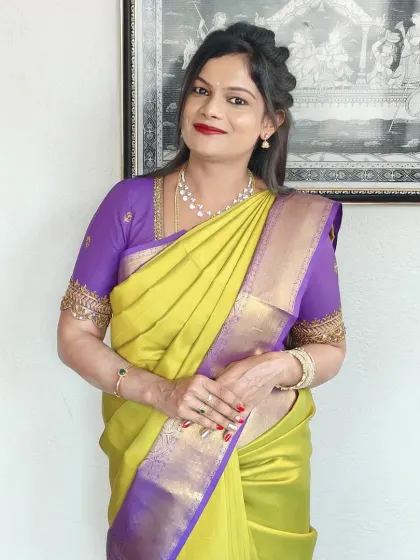 This is my client Kalyani, all dressed up for a family function. Her bright red nails add a pop of color that works beautifully with her lime green and purple saree.