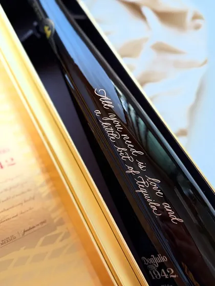 "All you need is love and a little bit of Tequila." This custom engraved Don Julio 1942 bottle shows how you can add quotes or messages for a truly unique gift.