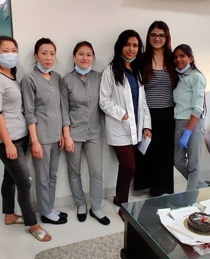 A group photo with my amazing clinical staff. We work as a close-knit team to ensure every patient's journey with us is a positive one.