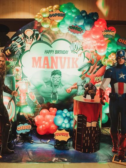 An epic Avengers superhero theme! The backdrop features Hulk, Thor, and Captain America, creating a powerful and exciting setting for a young fan's birthday.