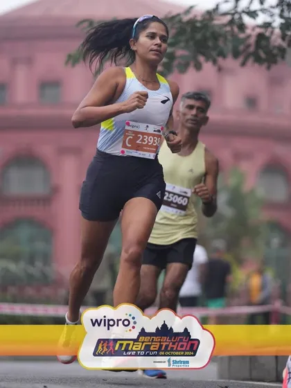 Mid-race focus during the Bengaluru Half Marathon. Performance isn't just about physical strength; it's about mental toughness. I coach my athletes to build resilience so they can push through the tough moments and execute their race plan.